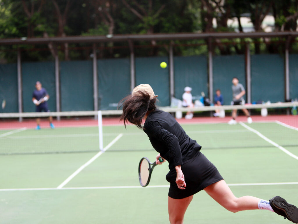 tennis girl serving for the game
