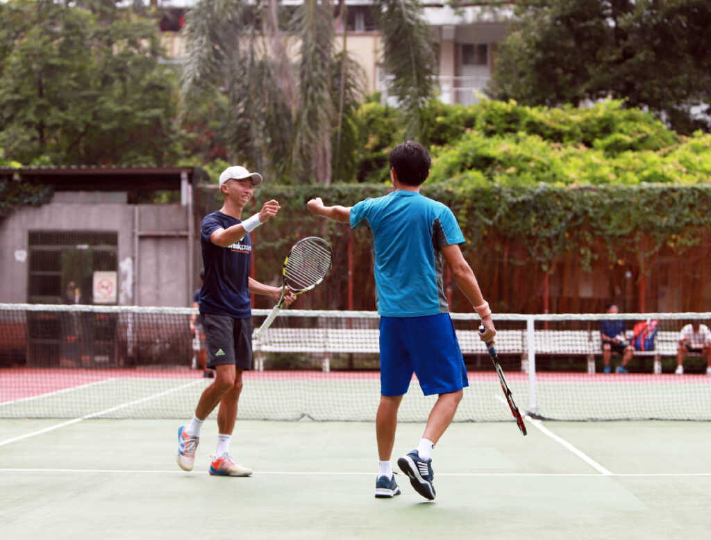tennis player fist bump moment